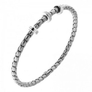 18K WHITE GOLD STRETCH SPRING BRACELET WITH DIAMONDS. 