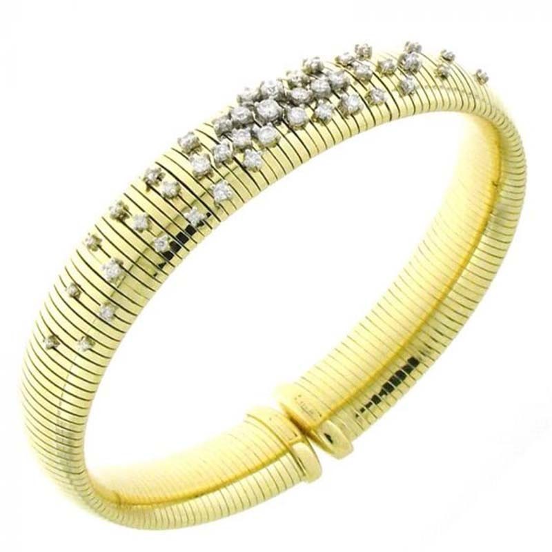 http://williambarthman.bluestar-apps.com/upload/product/18K WHITE AND YELLOW GOLD STARDUST DIAMOND BRACELET. 