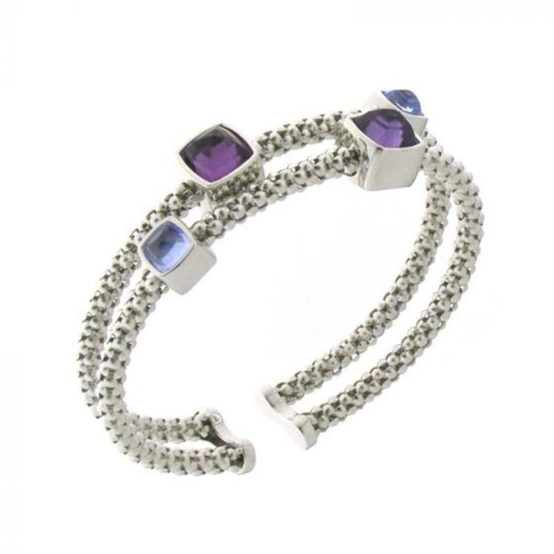 http://williambarthman.bluestar-apps.com/upload/product/CHIMENTO WG DOUBLE STRETCH CUFF W/AMETHYST & BLUE TOPAZ. 