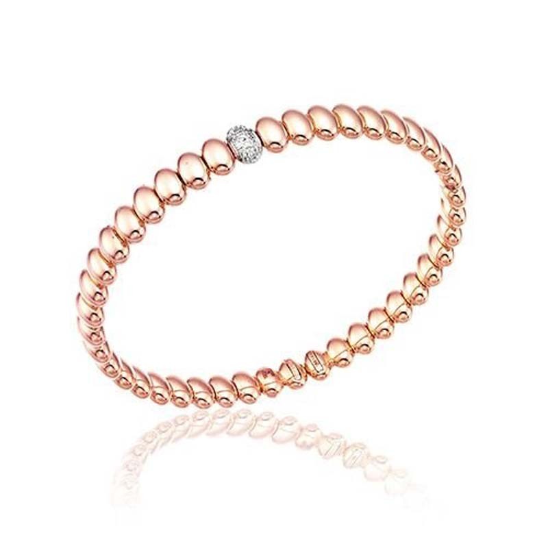 18K WHITE AND PINK GOLD ARMILLAS ACQUA BRACELET WITH DIAMONDS.